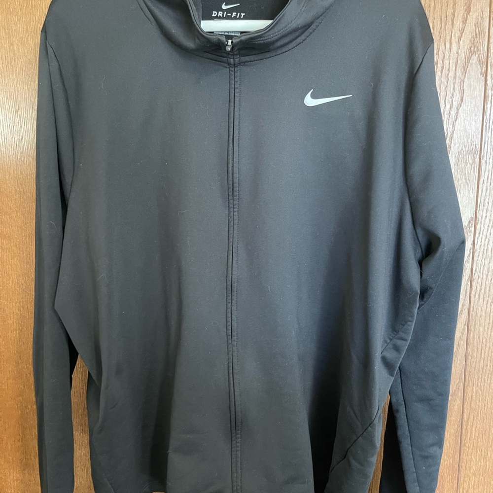Nike Women's Black Dri-FIT Jacket with hood and thumbholes